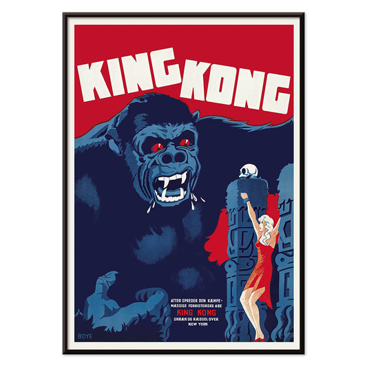 King Kong movie poster by Boye showing giant gorilla with red eyes grabbing a building and a woman in a red dress in an iconic scene, with black aluminium frame on white background