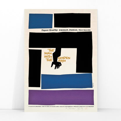 Movie poster for The Man with the Golden Arm by Saul Bass featuring bold abstract shapes and a stylized arm and hand in vibrant colors, framed and displayed in modern living room decor