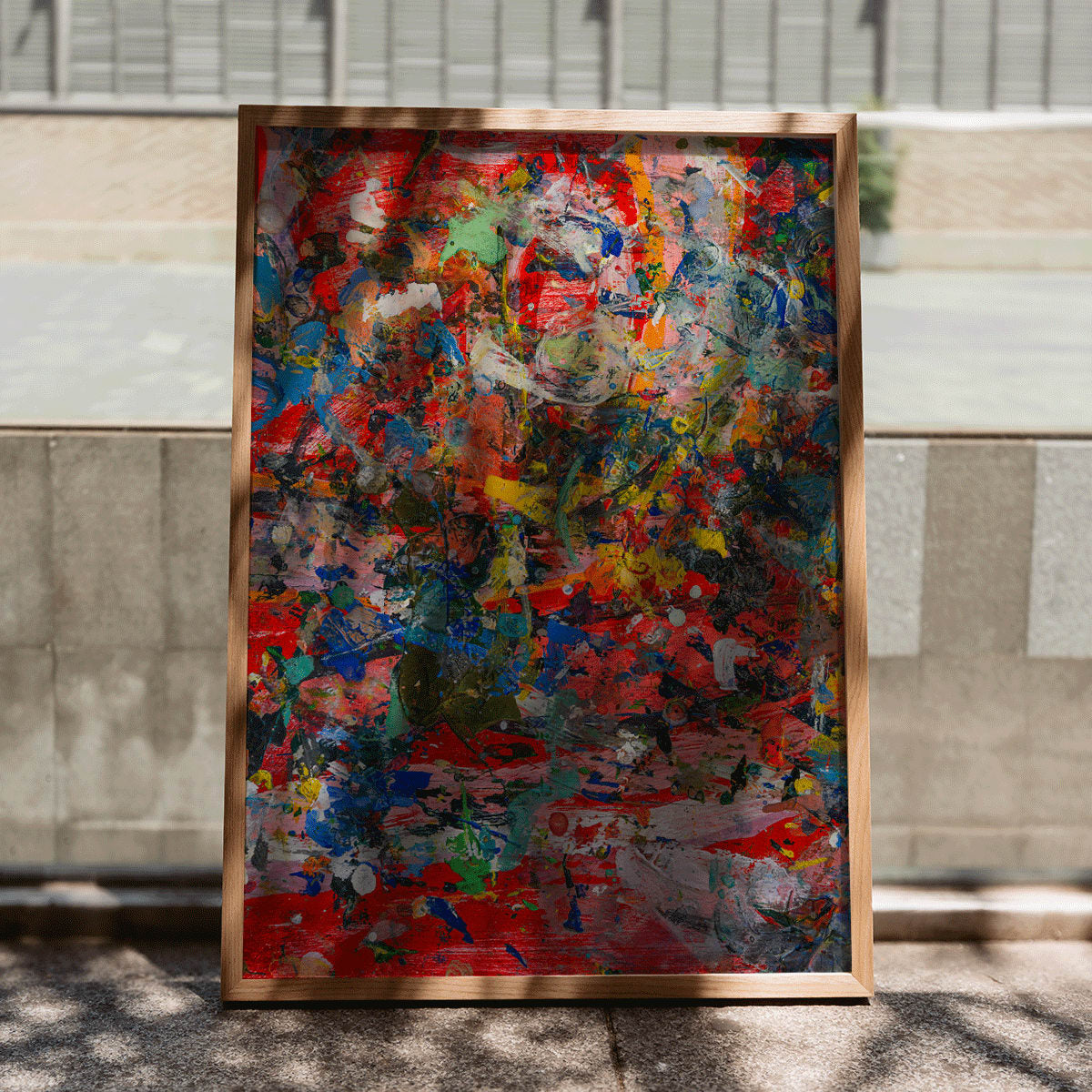 Colorful abstract artwork and poster featuring intricate patterns and textures in Abstract Patchwork 2 by Anonymous, framed and displayed in modern living room decor