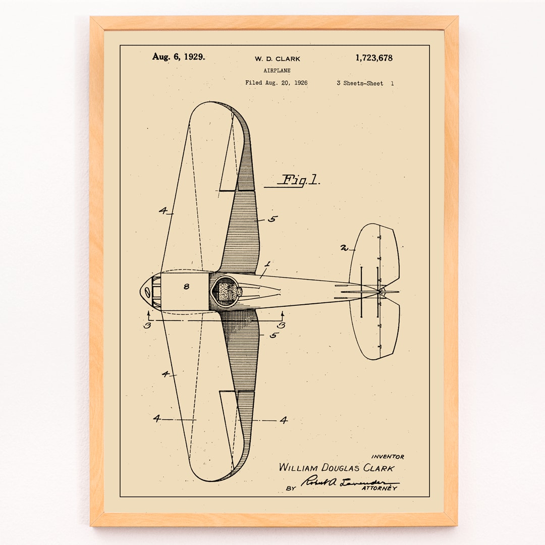 Airplane patent design drawing and detailed blueprint poster by WD Clark with annotated parts and technical specifications, framed and displayed in modern living room decor