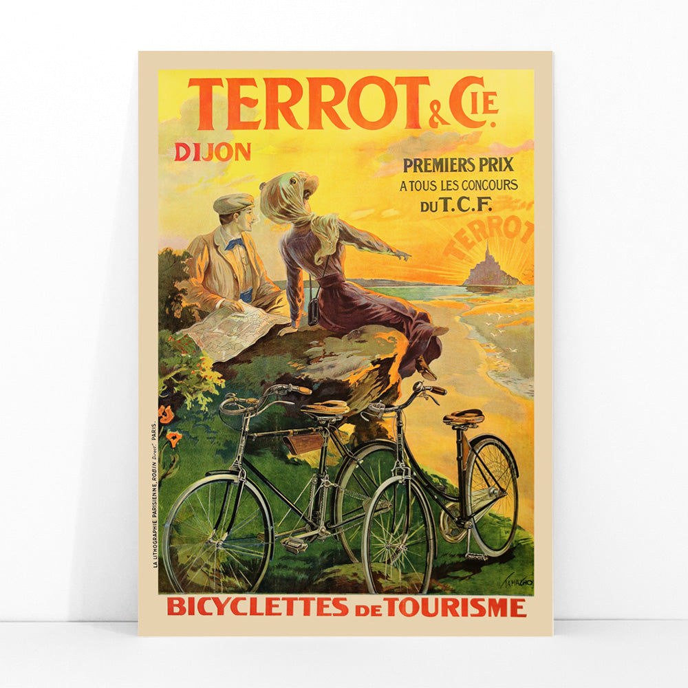 Vintage poster Terrot And Cie Dijon Bicyclettes De Tourisme by Armand Masson showing a couple with touring bicycles overlooking the coast at sunset, framed and displayed in modern living room decor