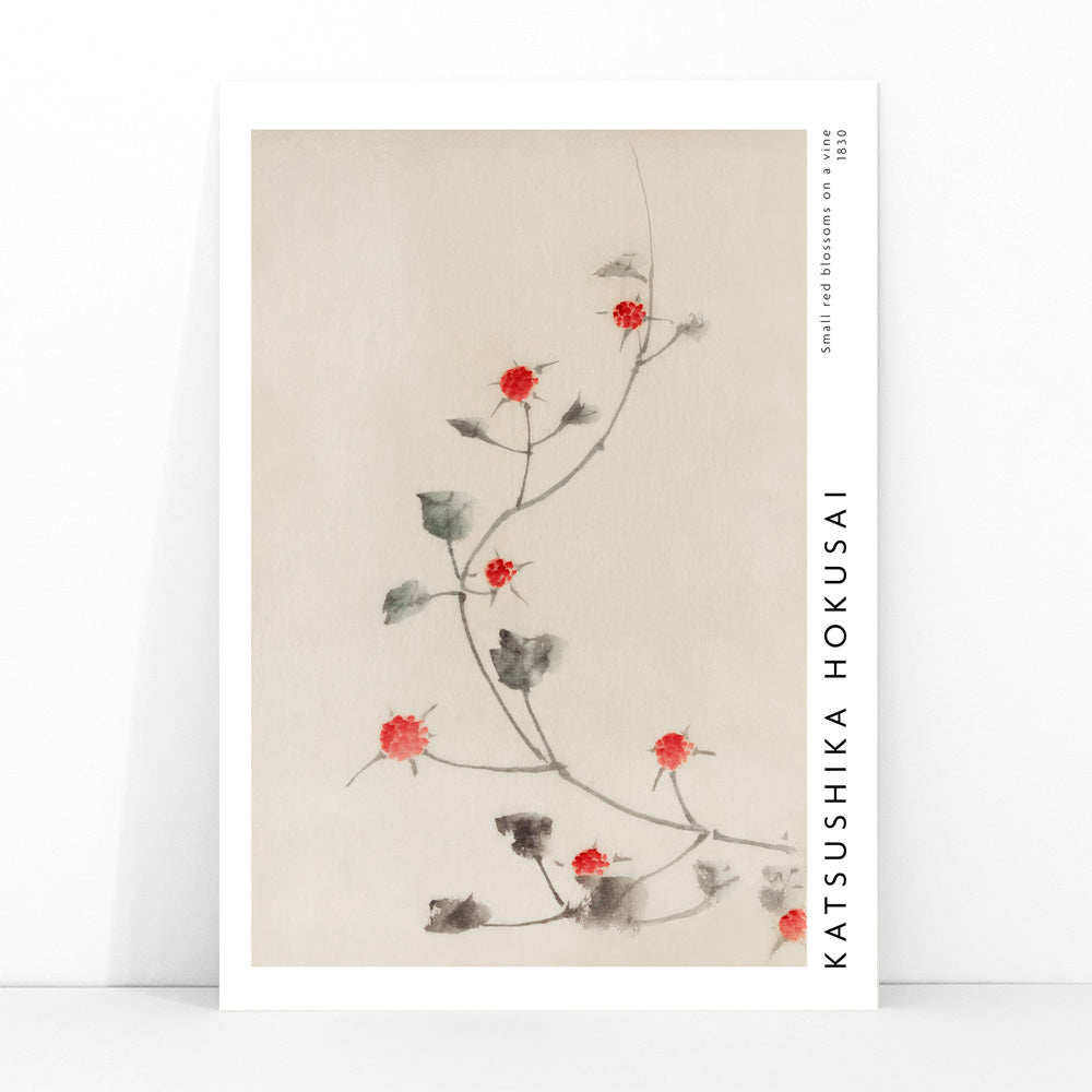 Small Red Blossoms on a Vine artwork by Katsushika Hokusai featuring delicate red flowers and green leaves on a light background, framed and displayed in modern living room decor