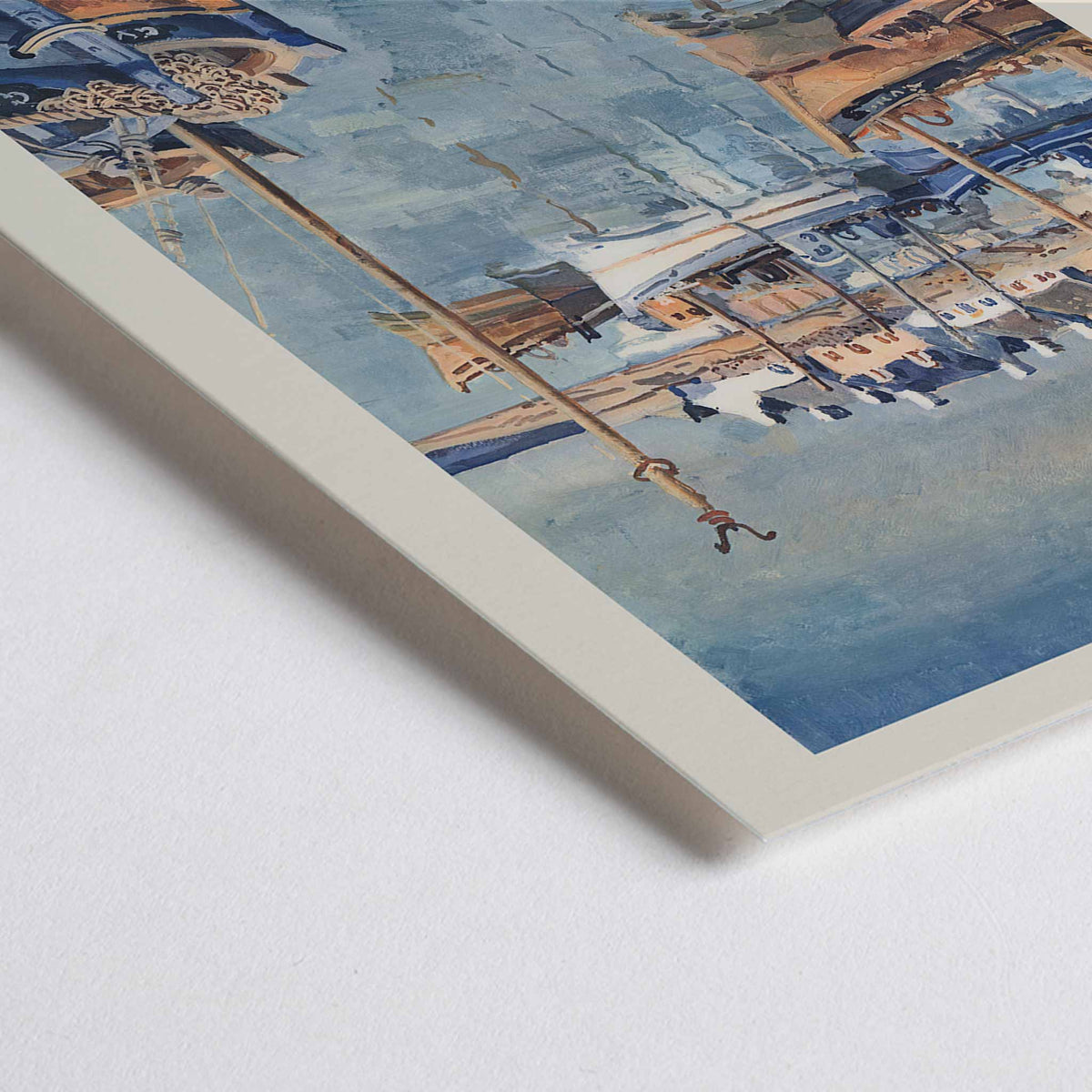Closeup detail of France Brittany Railway poster by Edmond Ceria featuring blue harbor boats, pale village roofs, cream sky, and coastal scenery
