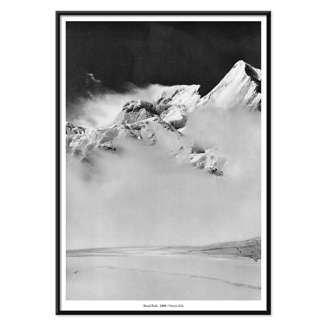 Broad Peak mountain view from Godwin-Austen Glacier snow-covered and obscured by clouds photo by Vittorio Sella, with black aluminium frame on white background