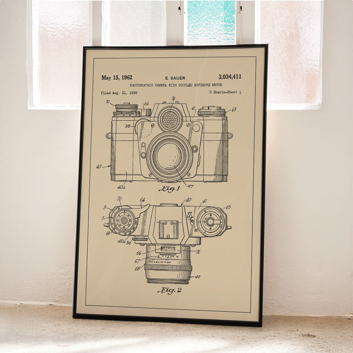 Technical illustration and poster of photographic camera with coupled exposure meter patent by E Sauer showing detailed technical drawings, framed and displayed in home decor