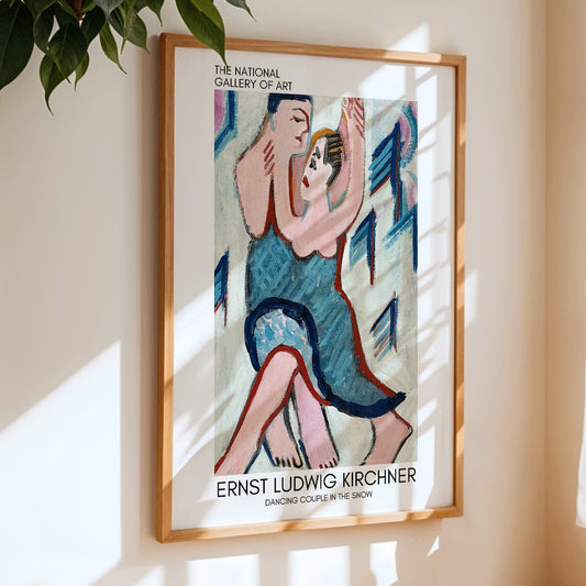 Dancing Couple in the Snow by Ernst Ludwig Kirchner vibrant expressive painting of a couple embracing and dancing in a snowy scene, framed and displayed in home decor