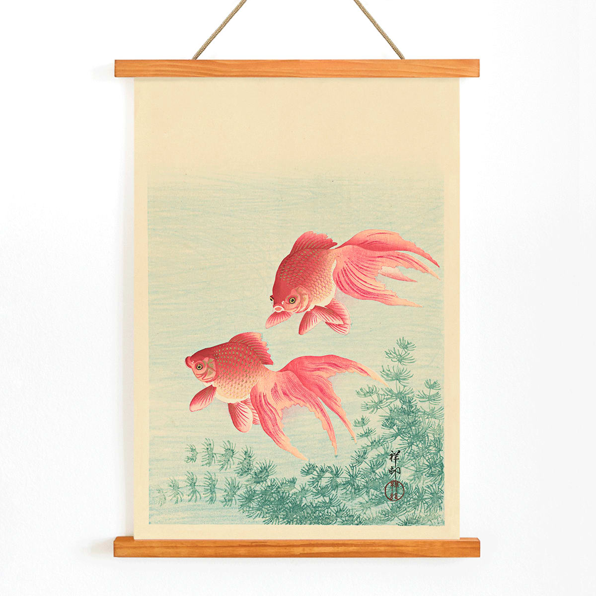 Two Goldfishes by Ohara Koson poster with two vibrant goldfish swimming among aquatic plants in blue water, with wooden magnetic frame on white background