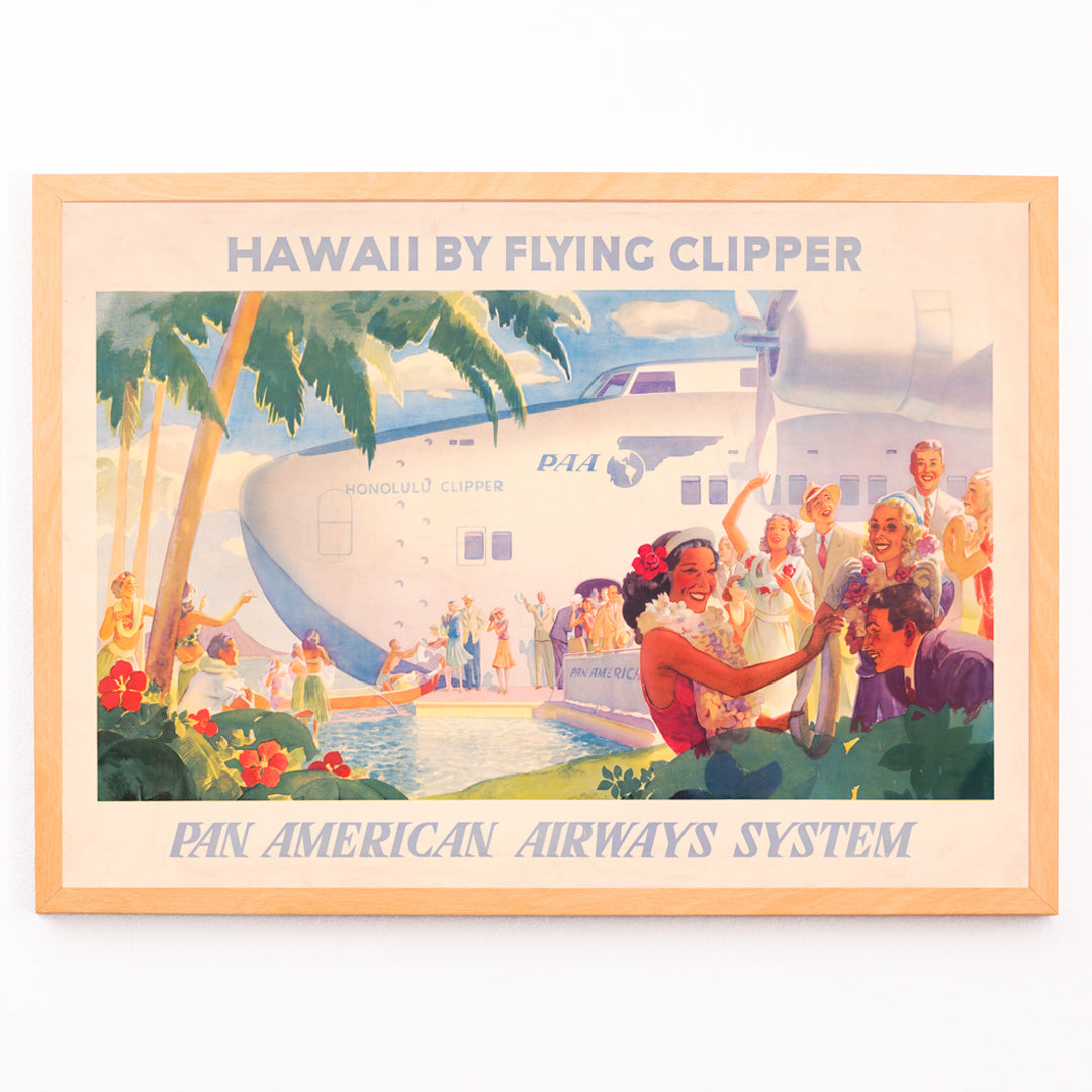 Closeup detail of Vintage travel poster of Pan American Airways seaplane in Hawaii with people greeting each other with leis and Hawaiian welcome scene