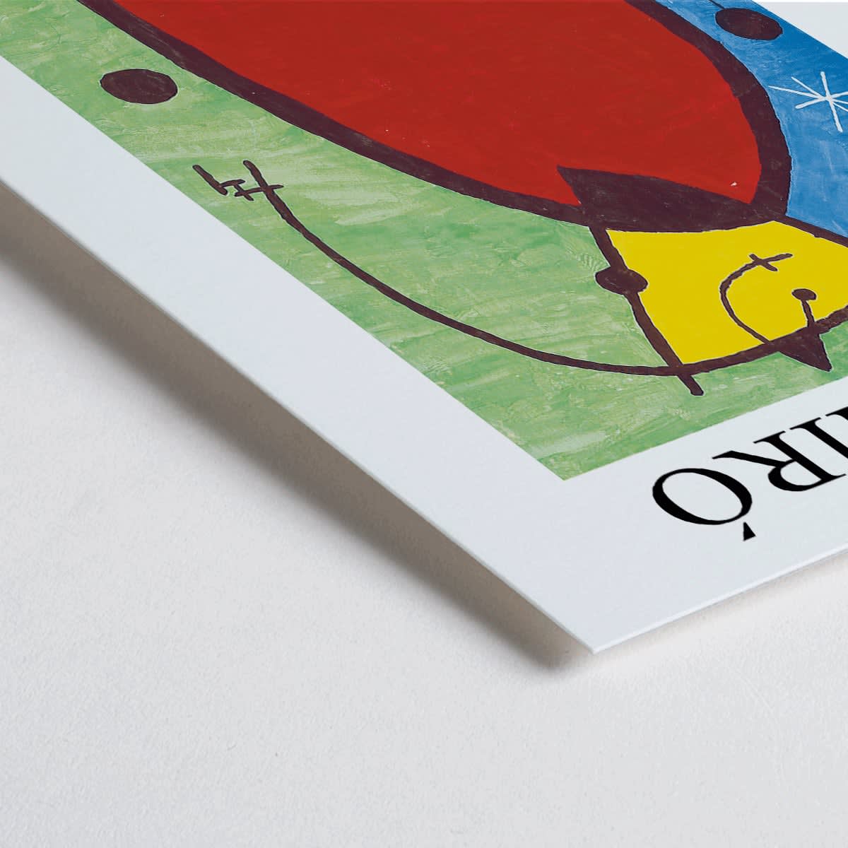 Closeup detail of Exhibition poster of El Comienzo by Joan Miro with colorful abstract shapes and vibrant colors in a framed display