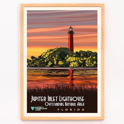 Jupiter Inlet Lighthouse Outstanding Natural Area in Florida artwork and poster with sunset reflection on water and trees, framed and displayed in modern living room decor