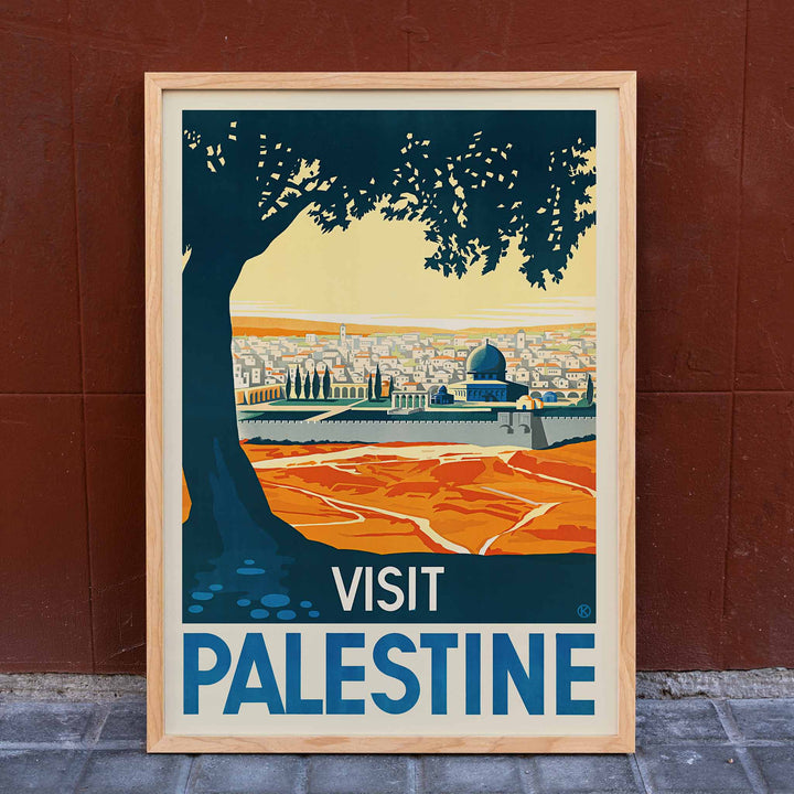 Franz Kraus Visit Palestine poster with sunlit city, mosque, ochre fields, blue sky, and dark tree silhouette, framed and displayed in home decor