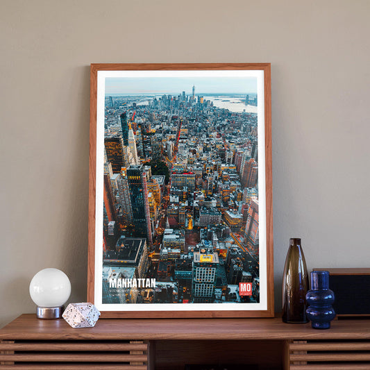 Aerial view and poster of Manhattan skyline in New York by Mo Art Gallery, framed and displayed in home decor