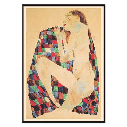 Female Nude on Checkered Cloth by Egon Schiele showing a nude woman sitting on a colorful patterned fabric poster, with black aluminium frame on white background