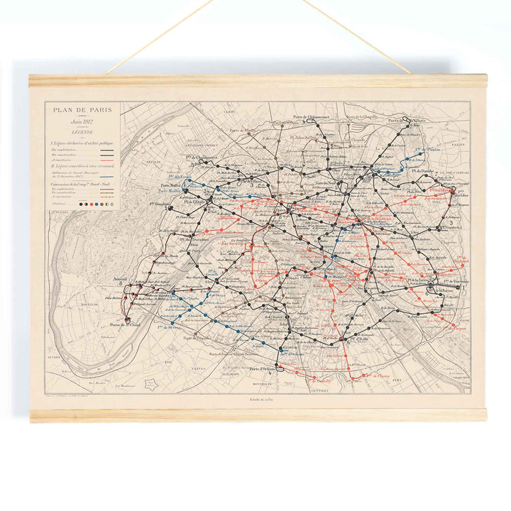 Louis Wuhrer Paris metro map poster vintage city plan with black and red rail lines, with wooden magnetic frame on white background