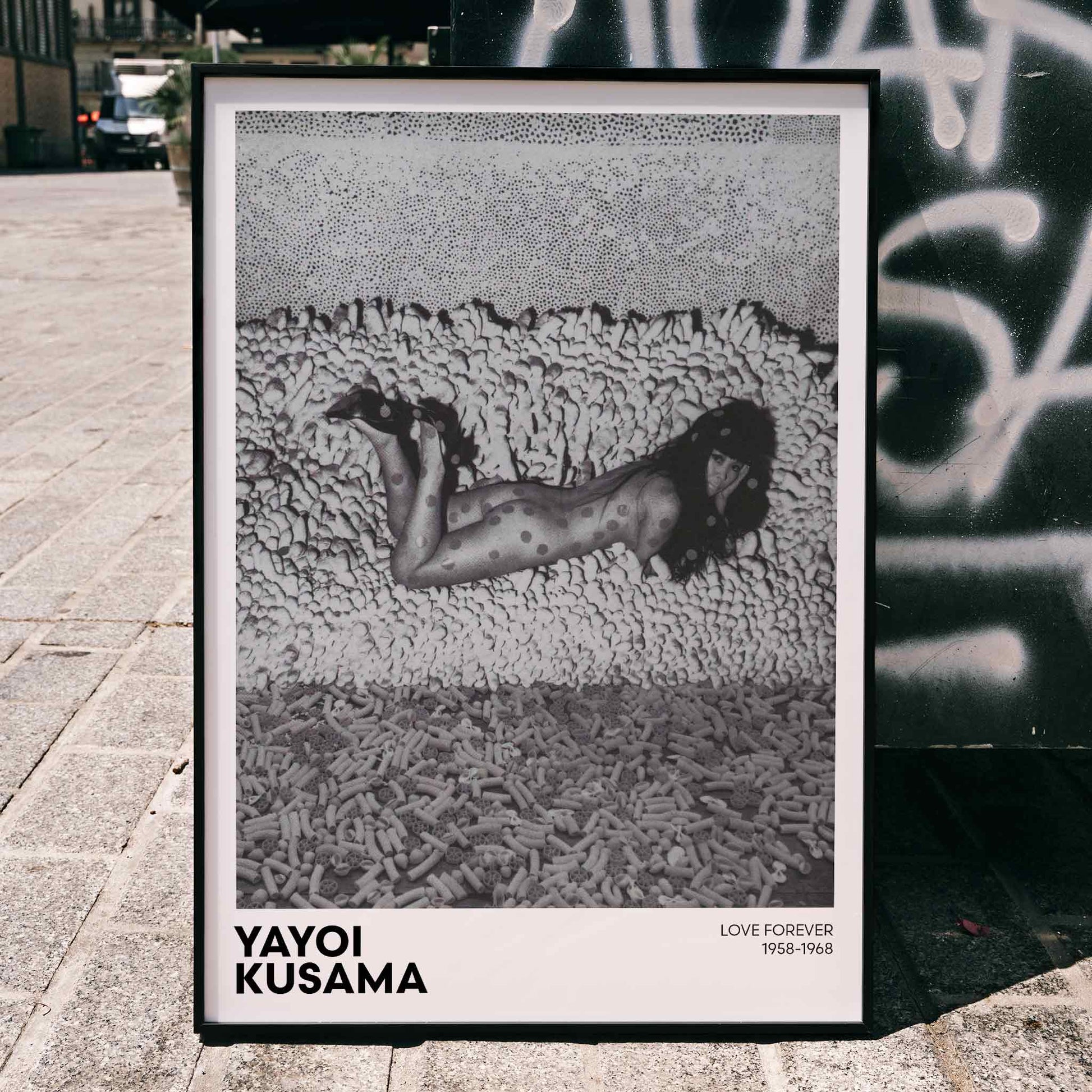 Yayoi Kusama black and white artwork featuring a dotted figure and a woman with polka dots on a textured background poster, framed and displayed in home decor