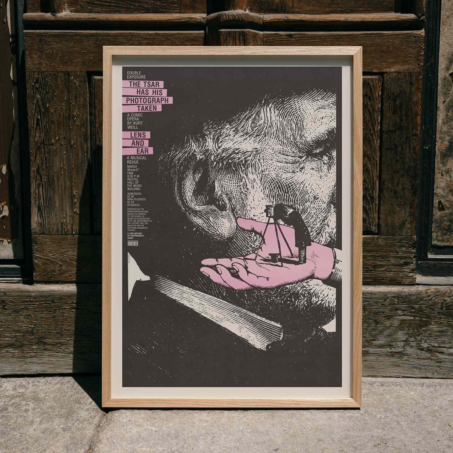 Surreal poster art by Lanny Sommese titled The tsar has his photograph taken featuring a giant ear and a photographer on a hand, framed and displayed in home decor