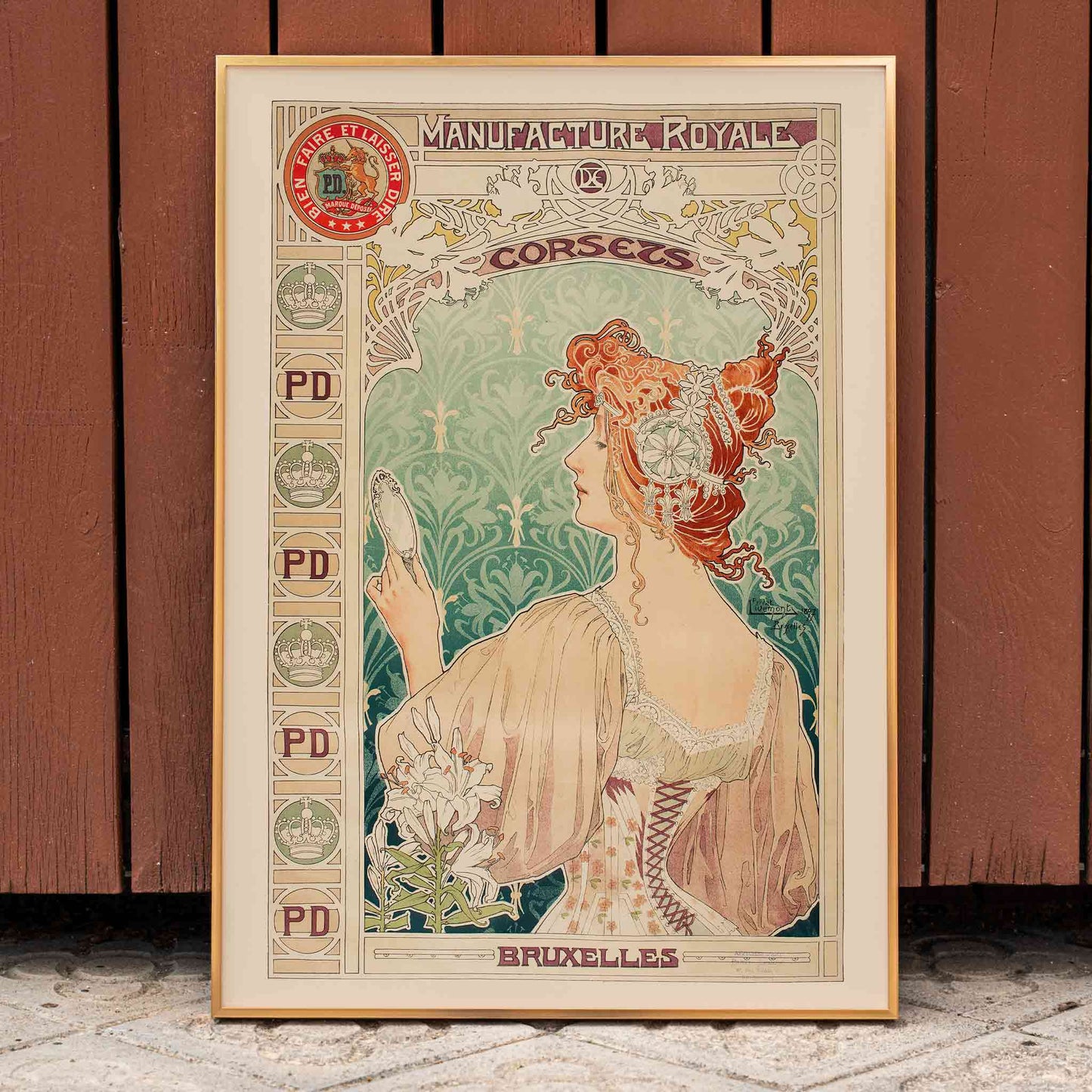 Art Nouveau poster by Alphonse Mucha featuring a woman in a corset with mirror and floral details Manufacture Royale De Corsets, framed and displayed in home decor
