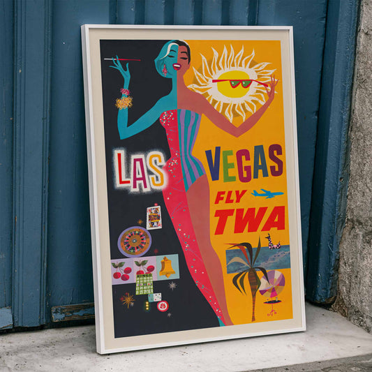 Colorful vintage Las Vegas travel poster by David Klein featuring showgirl stylish woman sun and casino imagery promoting Las Vegas fly TWA, framed and displayed in home decor