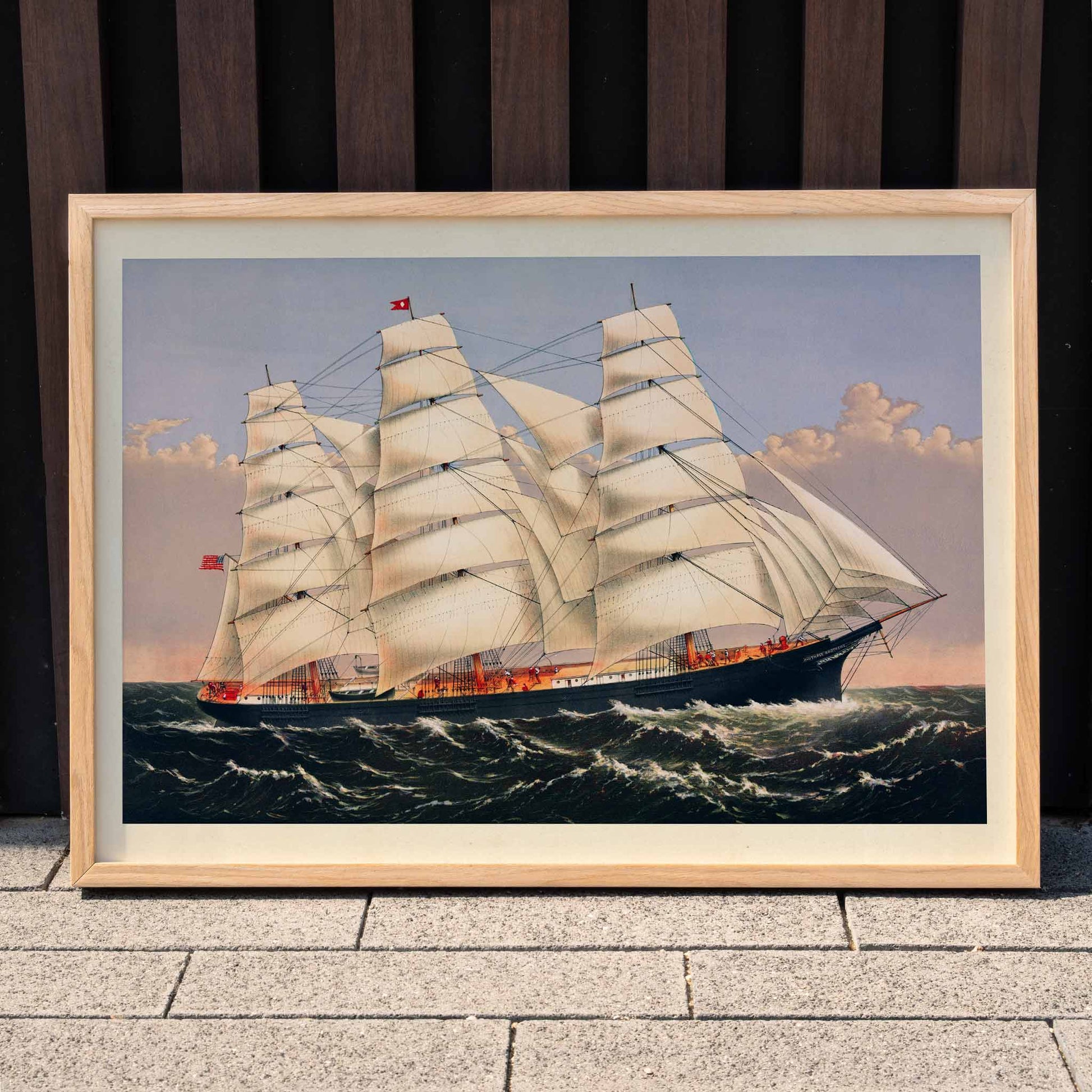 Clipper Ship Three Brothers by Currier and Ives majestic sailing ship poster at sea largest vessel in the world, framed and displayed in home decor