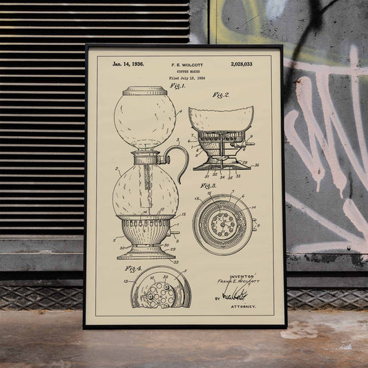 Vintage patent drawing and blueprint poster of Coffee Maker by F E Wolcott featuring detailed diagrams, framed and displayed in home decor