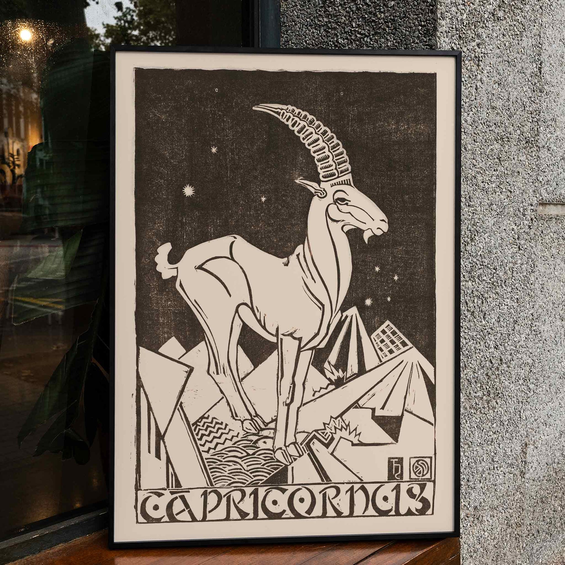 Capricorn zodiac sign illustration and poster featuring a stylized goat under stars in an abstract landscape artwork titled Capricornus by Henri van der Stok, framed and displayed in home decor