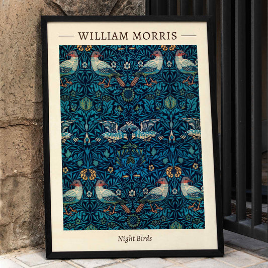 Night Birds by William Morris colorful patterned illustration and poster with intricate birds and floral designs in rich blue and green tones, framed and displayed in home decor
