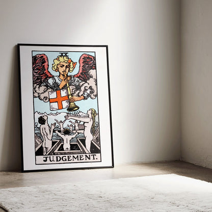 Judgement tarot card by Rider Waite showing an angel with a trumpet and people rising from graves poster, framed and displayed in home decor