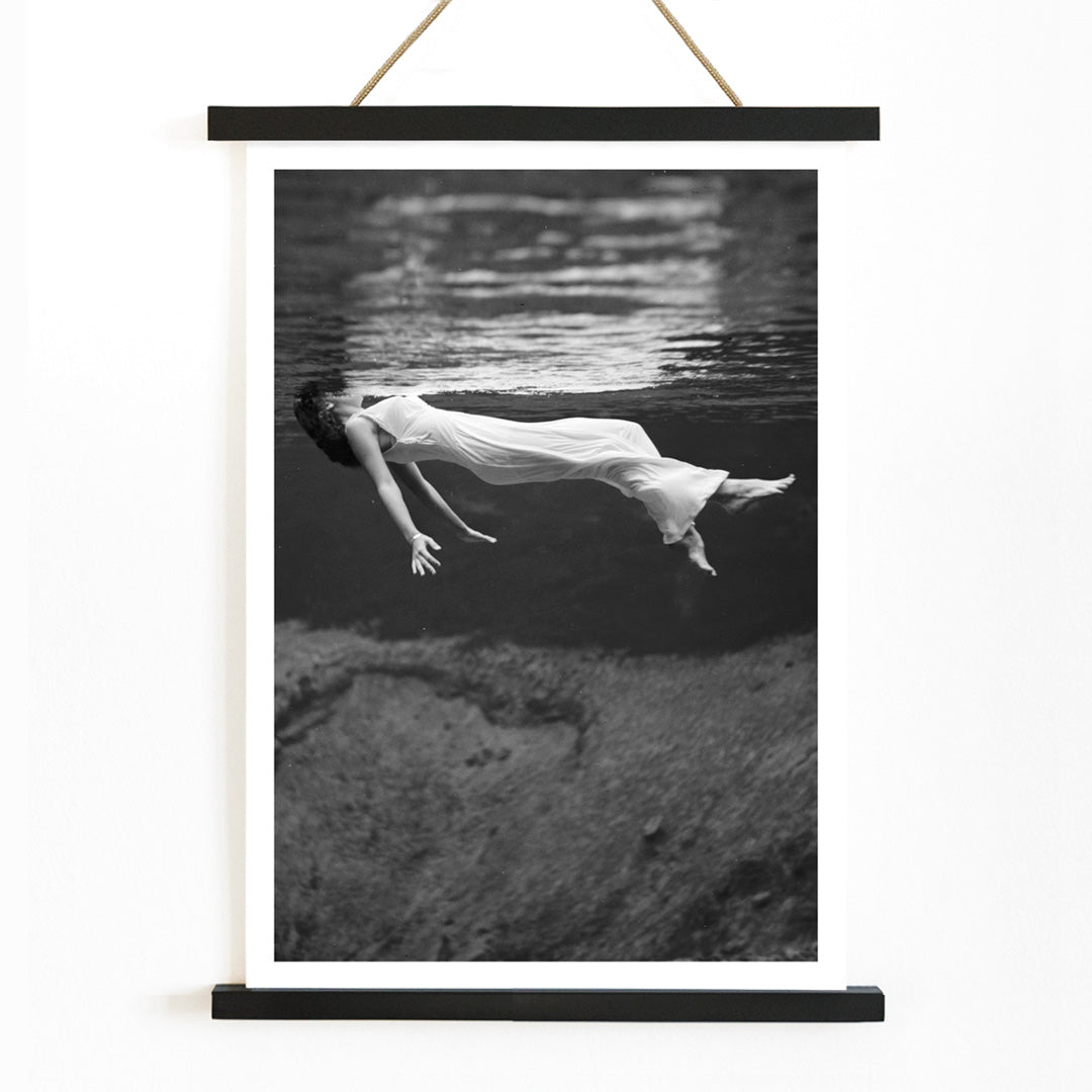 Underwater woman in white flowing dress at Weeki Wachee spring Florida by Toni Frissell, with wooden magnetic frame on white background