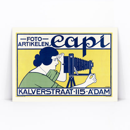 Vintage art deco poster of a woman using a vintage camera at Capi Camera Shop by Johann Georg van Caspel, framed and displayed in modern living room decor